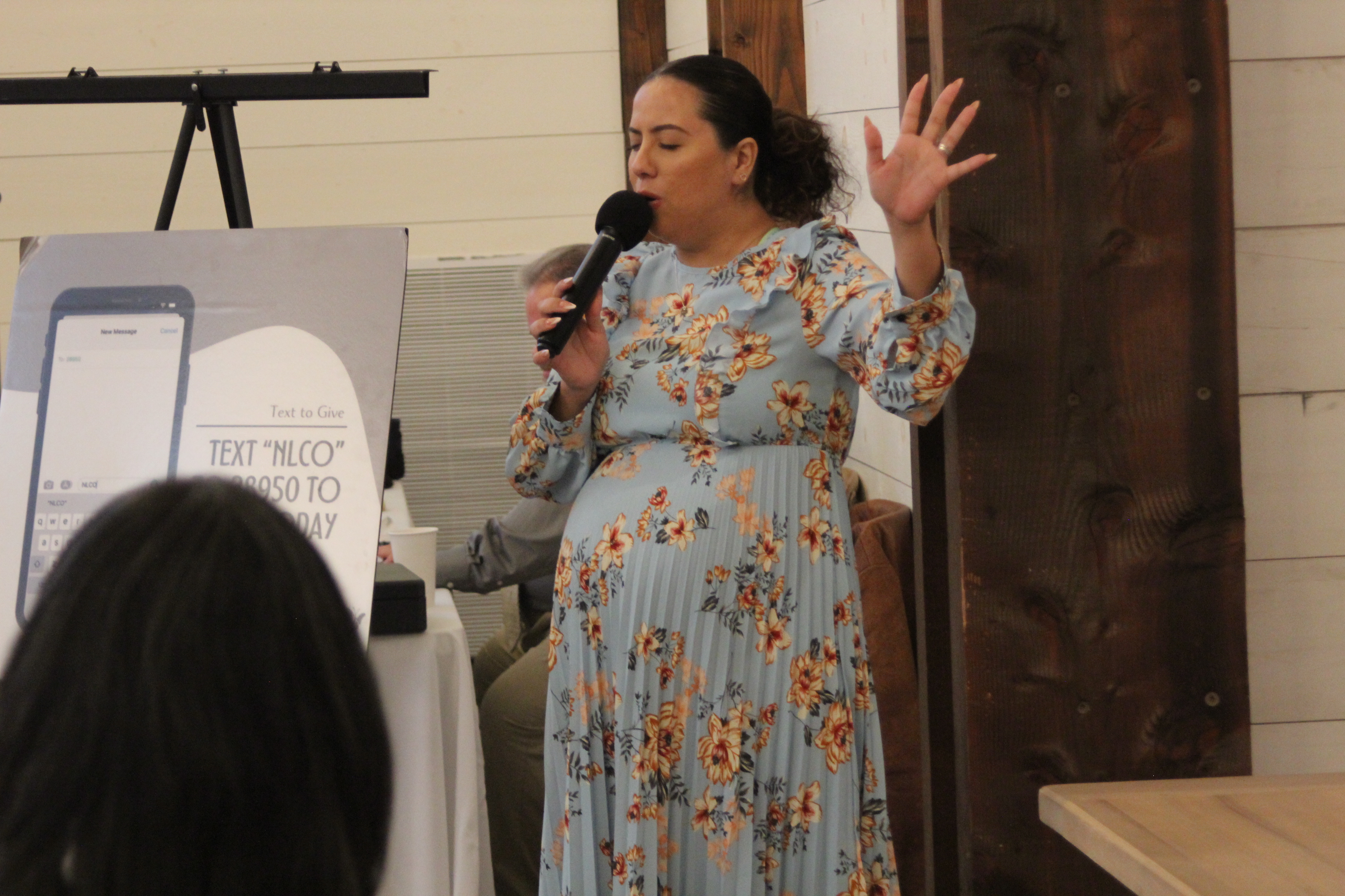 Hands out in worship