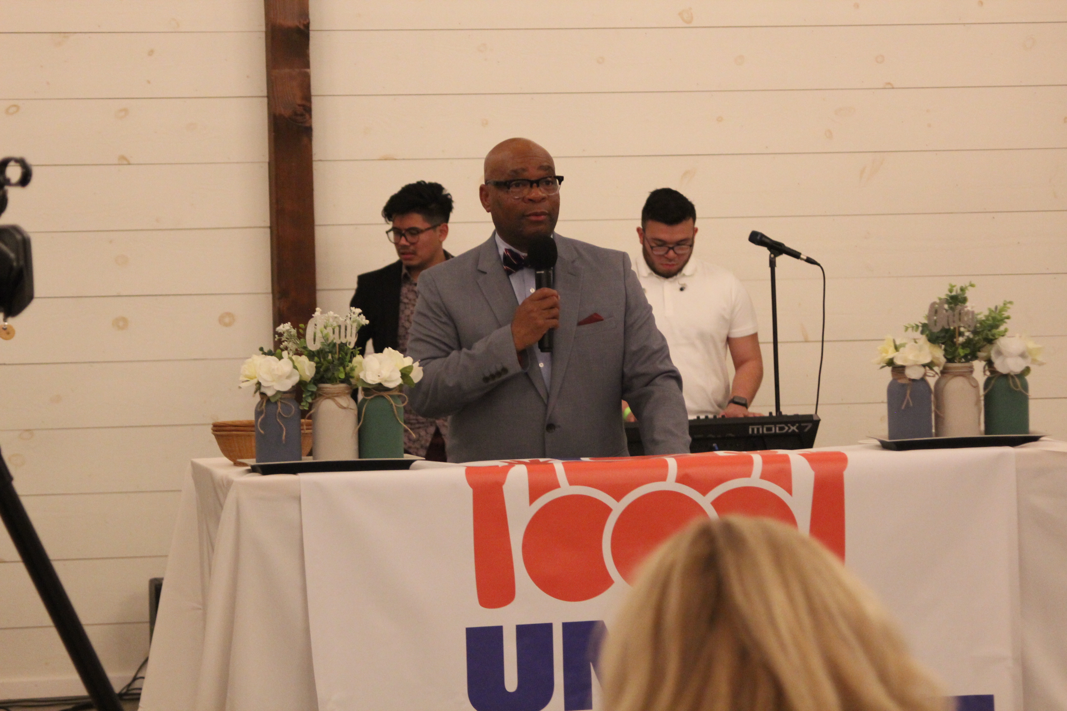 Pastor preaching at the conference